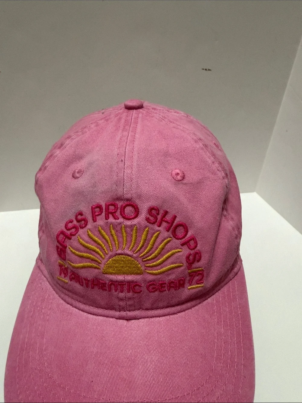 Vintage Bass Pro Shops Pink Baseball Cap with Yellow Sun Embroidery